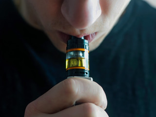 Man smoking vape