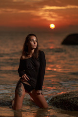 girl woman portrait with hat beach sunset