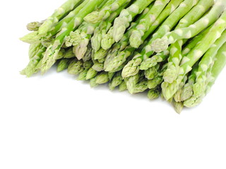 green fresh asparagus isolated on white background