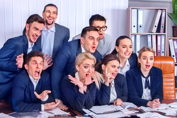 Mad business people office in high school celebrate successful passing exams. Employees scoff at boss. Men and women fooled to give bunny fingers prank. They make faces with joy.