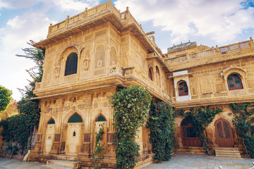 Fototapeta na wymiar Royal palace building exterior with Rajasthan architecture and art work at Jaisalmer Rajasthan, India.