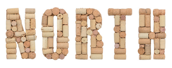 Word NORTH made of wine corks Isolated on white background
