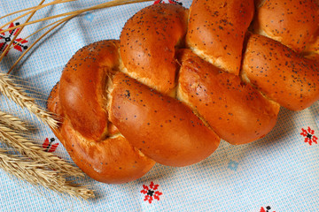 Challah on a tablecloth close-up