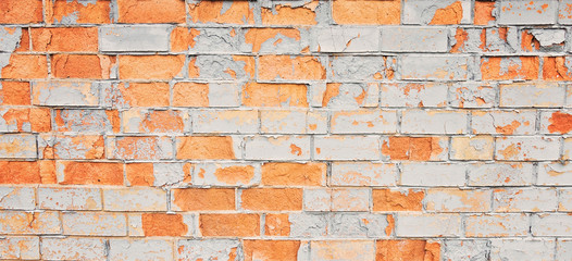 Obraz premium Vintage old painted distressed grungy brick wall surface.