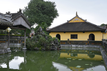 Naklejka premium The Truong du Pavilion and lake within the Dien Tho Residence in the Imperial City, Hue, Vietnam