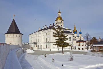 Fototapeta na wymiar The bishop's house, the fortress wall and the round tower. Ensemble of the Kremlin and the Court yard. Tobolsk. Tyumen region