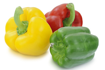 Yellow, green and red peppers isolated on white background 