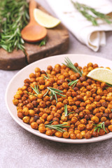 Indian cuisine. Roasted chickpeas with lime and rosemary