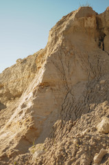 Opencast mining quarry. This area has been mined for sand and other minerals. Restoration of a part of the mined glass sand quarry. Dunes of the sand quarry. Landscapes and Nature