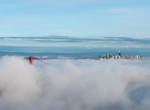 Dense Clouds Covering The San Francisco Golden Gate with Downtown in the Background