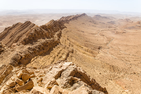 Desert crater mountain ridge cliffs landscape view, Israel nature.