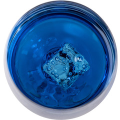 Blue carbonated drink in a glass and ice, close-up on a white background.