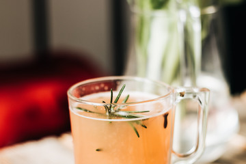 Tasty fruit tea with rosemary, healthy beverage