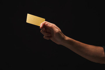 Closeup of male hand holding blank plastic card