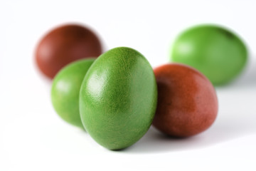 Easter eggs red and green isolated on white background.