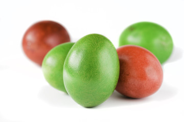Easter eggs red and green isolated on white background.