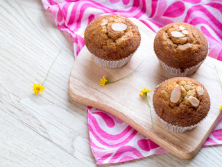 Homemade banana cupcake on wood tray white background, sweet secne for party