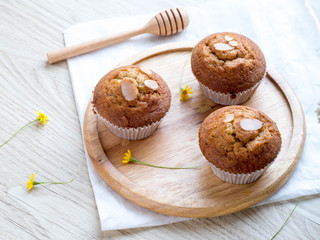 Homemade banana cupcake on wood tray white background, sweet secne for party