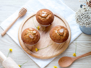 Homemade banana cupcake on wood tray white background, sweet secne for party