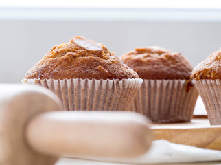 Homemade banana cupcake on wood tray white background, sweet secne for party