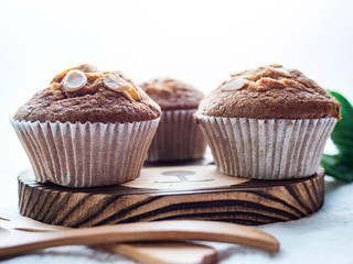 Homemade banana cupcake on wood tray white background, sweet secne for party