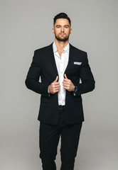 Handsome man in black suit