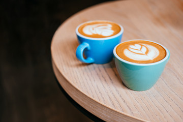 Two cups of cappuccino