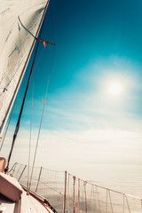 Fototapeta premium Yachting on sail boat during sunny weather