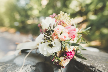 Beautiful wedding bouquet with different flowers, roses