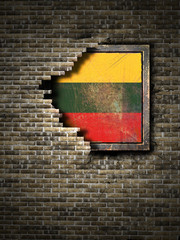 Old Lithuania flag in brick wall