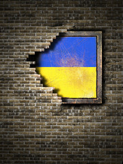 Old Ukraine flag in brick wall