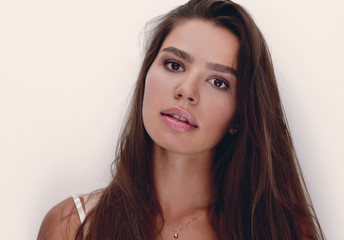 Naklejka premium face of beautiful woman with day makeup.