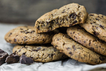 Freshly Baked Chocolate Cookies on Baking Paper. Sweet Biscuits. Homemade pastry.