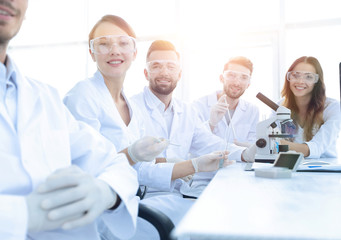 Fototapeta premium head of the scientific project and research team at the workplac