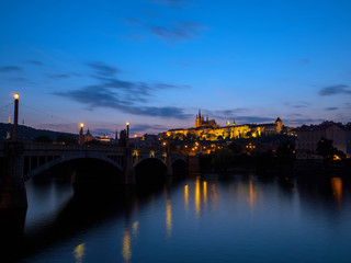 Amazing view of Prague town, Vltava river and Vitus Cathedral at late evening in Prague, Czech Republic