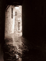 black and white alley of a village