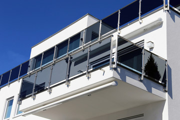 Balcony railing with glass and stainless steel - obrazy, fototapety, plakaty