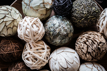 Fototapeta premium bowl of Various types of balls made from reuse materials decorating items