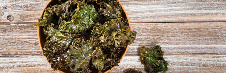 Baked Crispy Kale Chips. Selective focus.