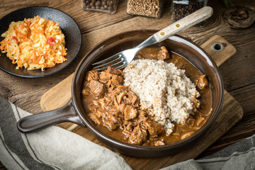 Barley groats with stewed meat.