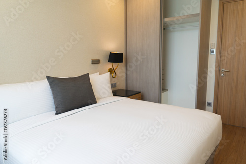 Bedroom Suite With Hanging Lamp In Hotel Stock Photo And