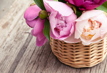 bouquet of peony in a basket