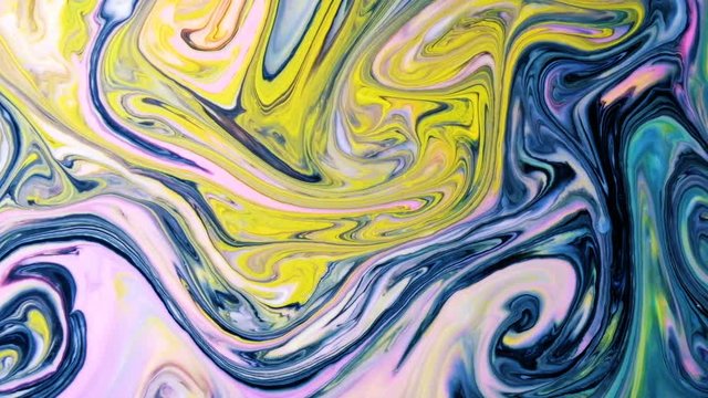 Abstract psychedelic background. Multicolored paints slowly blend into patterns