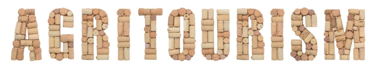 Word Agritourism made of wine corks Isolated on white background