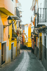 Fototapeta na wymiar Colorful street in the historic center of Villajoyosa, Spain
