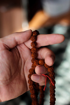 pix Rudraksha Mala Wallpaper https stock adobe com images hand of prayer holding rudraksha beads or rosary 197386031 start checkout 1 content id 197386031