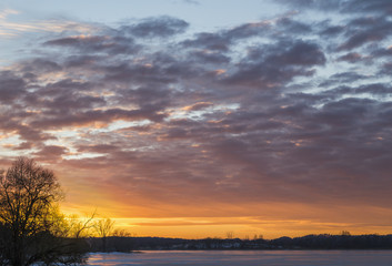 Fototapeta na wymiar Spring sunset sky and ice