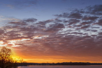Fototapeta na wymiar Spring sunset sky and ice