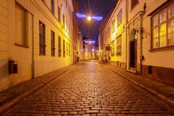 Fototapeta na wymiar Riga. Old street at night.