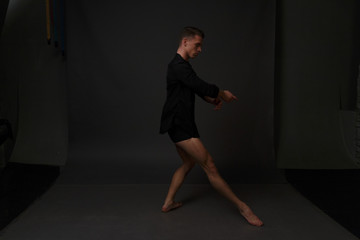 men is dances in a black pants